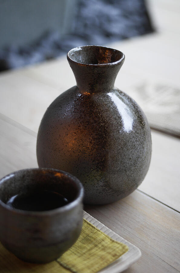Sake Bottle and Sake Bowl Photograph by Jeremy Maude