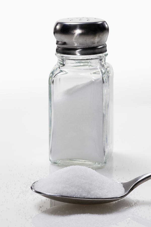Salt shaker with teaspoon Photograph by Ayala_studio