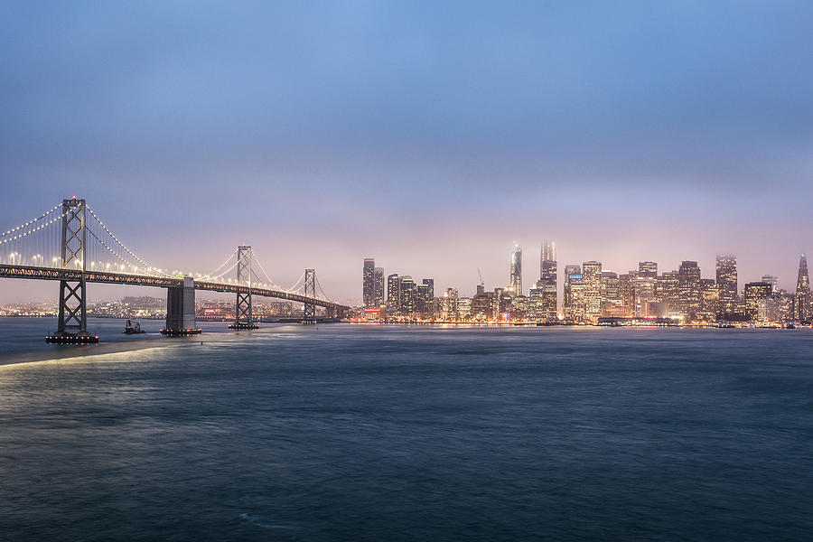 San Francisco skyline and the San Francisco Auckland bay bridge view from Treasure island Photograph by @ Didier Marti
