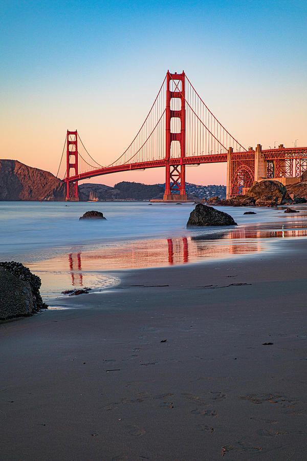 San Francisco - The Golden Gate Bridge at sunset from the beach Photograph by LeoPatrizi