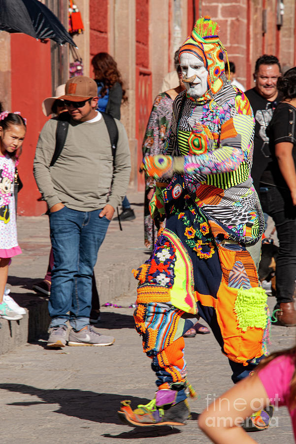 San Miguel de Allende Street Entertainer on the Move Photograph by Bob Phillips