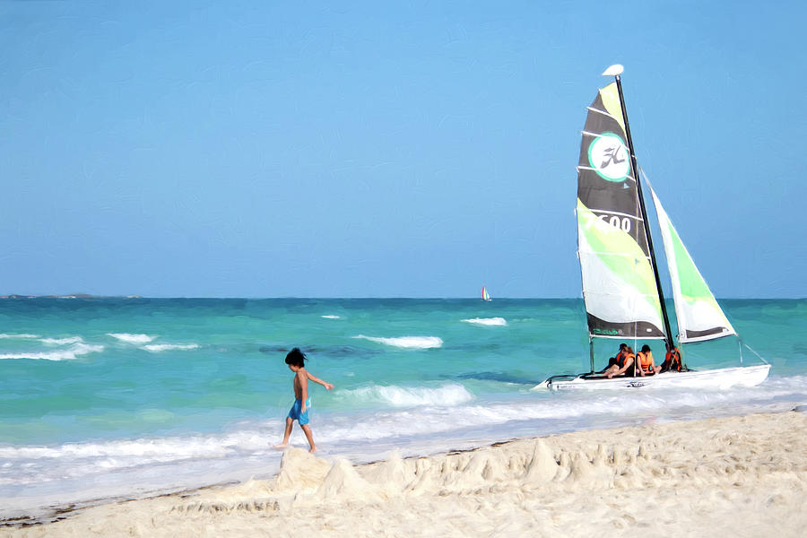 Sand Castles and Sailing at the Beach - Santa Maria, Cuba Photograph by Peggy Collins