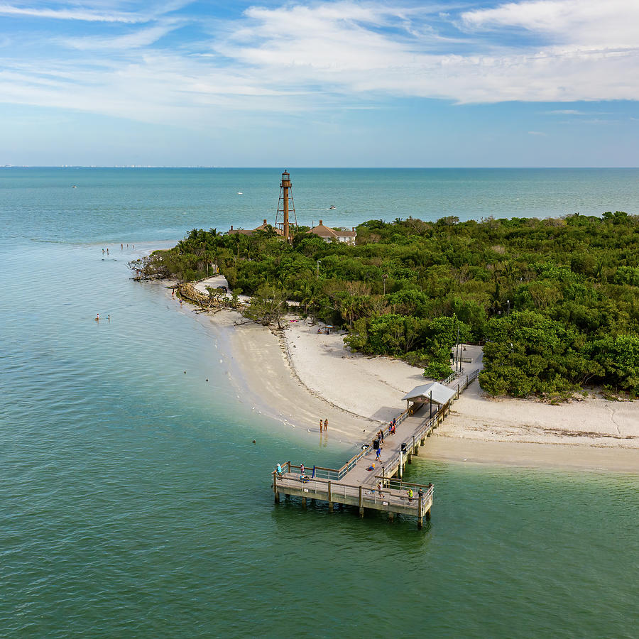 Lighthouse Photograph - Sanibel Lighthouse and Fishing Pier by Edward Saternus