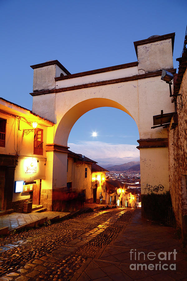 City Scene Photograph - Santa Ana Arch and Rising Full Moon Cusco Peru by James Brunker