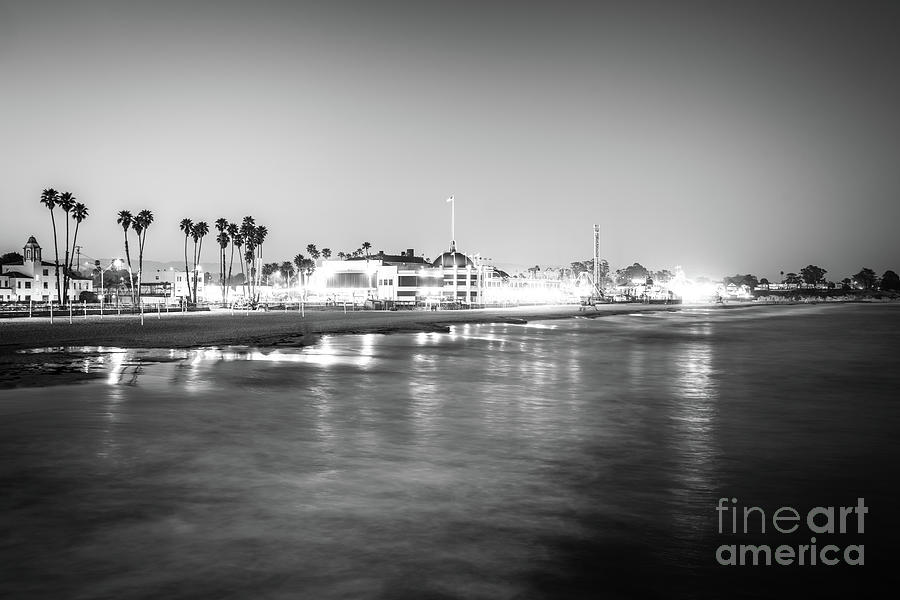 Black And White Photograph - Santa Cruz Beach Boardwalk at Night Black and White Photo by Paul Velgos