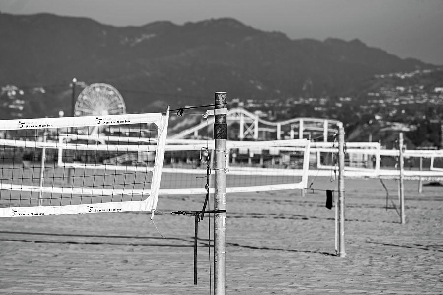 Santa Monica CA Volleyball Nets and Santa Monica Pier Black and White Photograph by Toby McGuire
