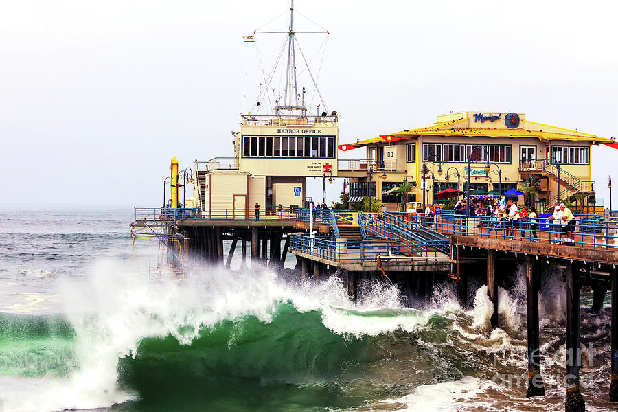 Santa Monica Pier Waves Crashing Photograph by John Rizzuto