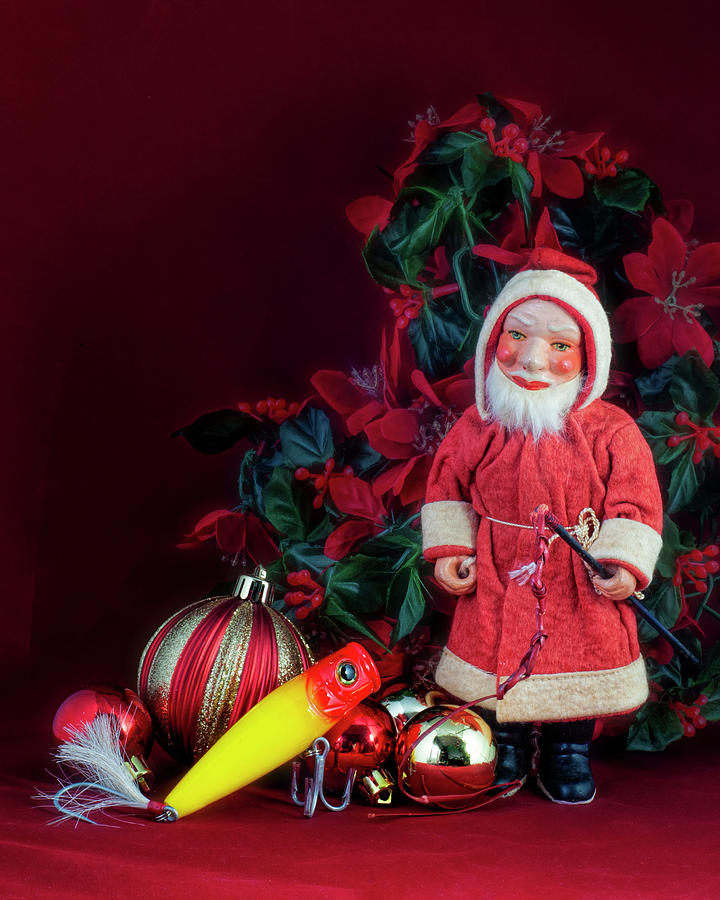 Santa with Christmas decorations and fishing lure. Photograph by Cordia Murphy
