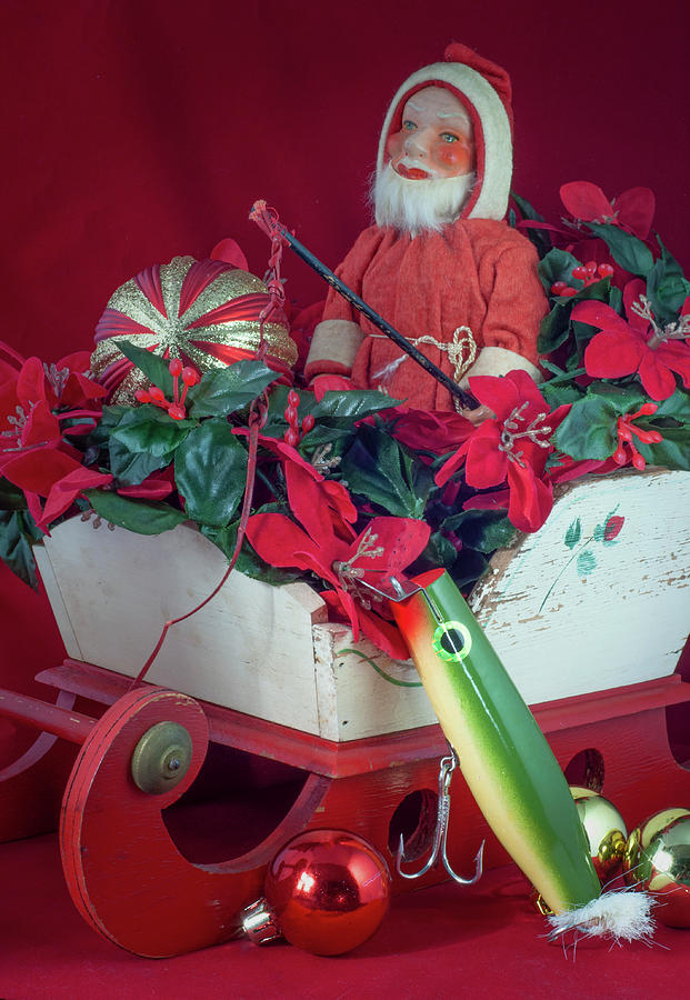 Santa with his sled and fishing lure Photograph by Cordia Murphy
