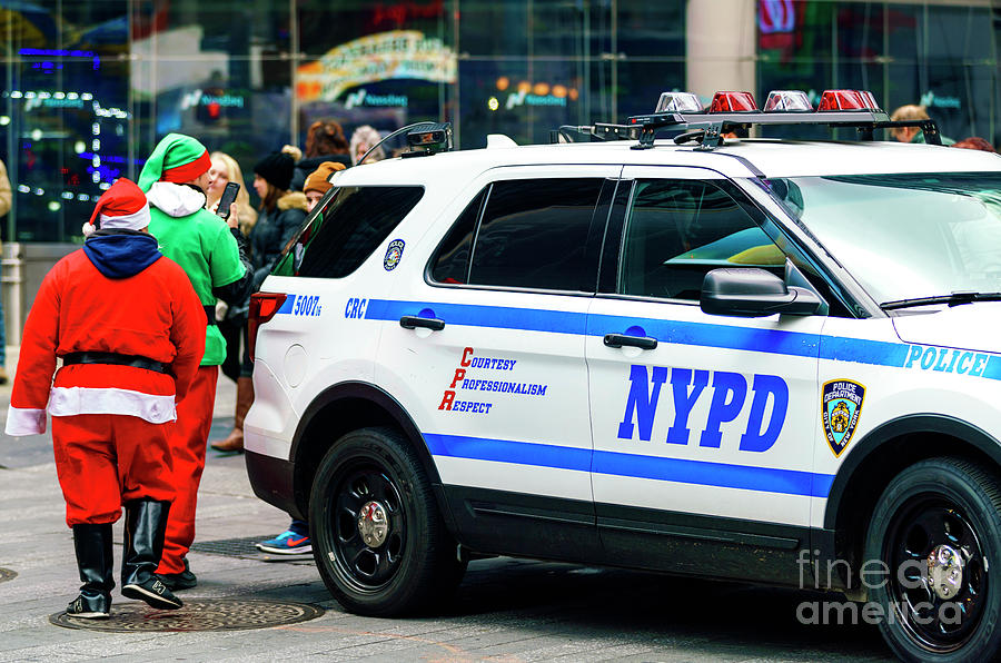 Santa With the NYPD Photograph by John Rizzuto