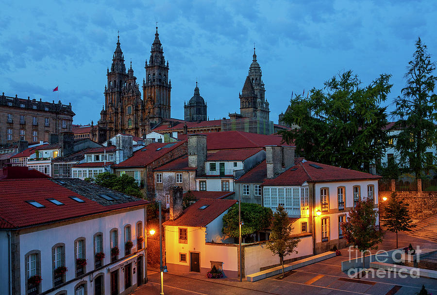 Santiago de Compostela Cathedral Spectacular View by Night Dusk with Street Lights and Tiled Roofs La Corua Galicia Photograph by Pablo Avanzini