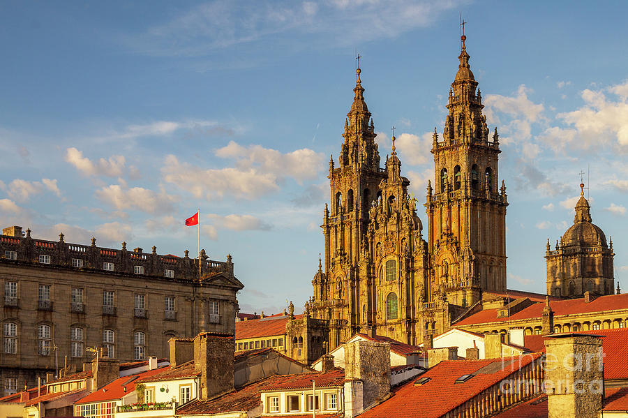Santiago de Compostela Cathedral Towers Close Up with Sun Light Hitting the facade and Tiled Roofs La Corua Galicia Photograph by Pablo Avanzini