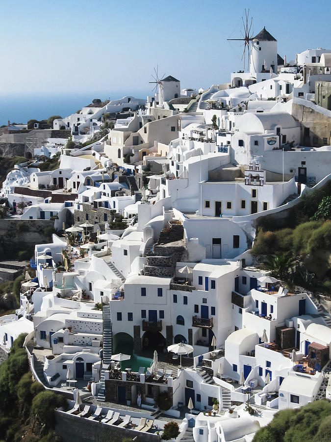 The hillside town of Oia Photograph by Alan Poon - Pixels