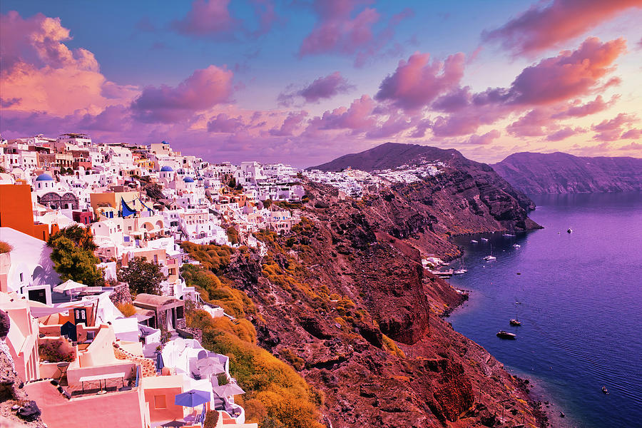 Santorini, Greece Beautiful city of Oia on a hill of white houses with blue  roof against dramatic pink sky, located in Greek Cyclades islands in Mediterranean  sea Photograph by Arpan Bhatia 