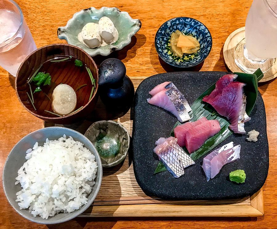 Sashimi lunch meal served on table Photograph by DigiPub