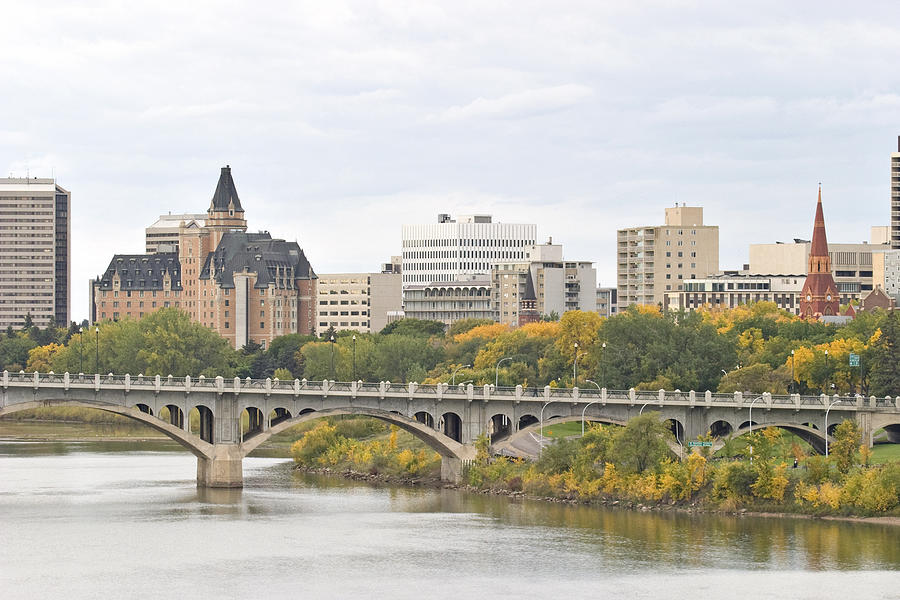 Saskatoon Downtown Skyline with Bridge Hotels and Condominiums Photograph by Dougall_Photography