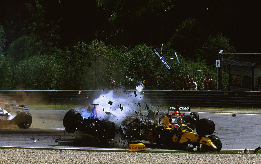 Sauber driver Nick Heidfeld of Germany smashes into Jordan-Honda driver Takuma Sato of Japan car Photograph by Tom Shaw