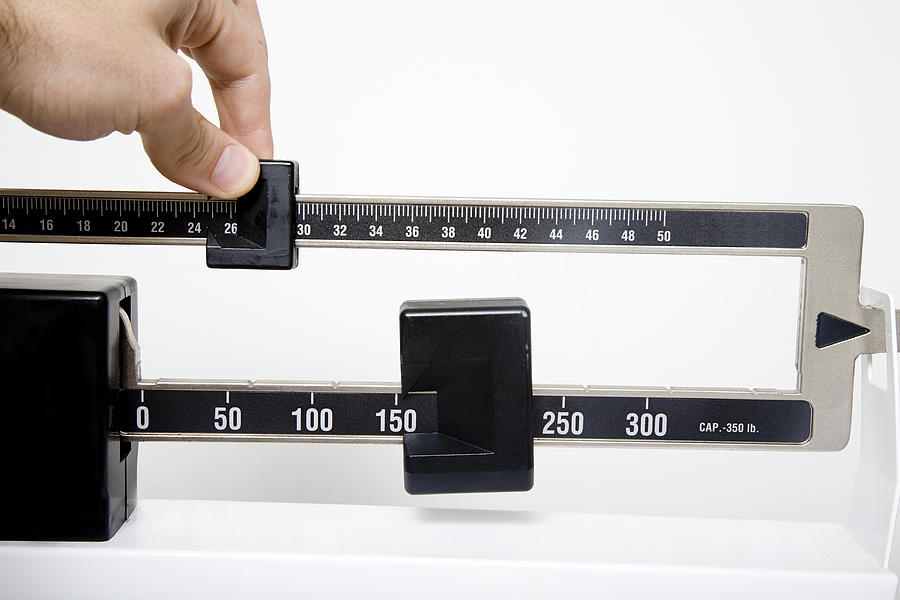 Scale to measure lengths with an adjustable slider Photograph by Patrickheagney