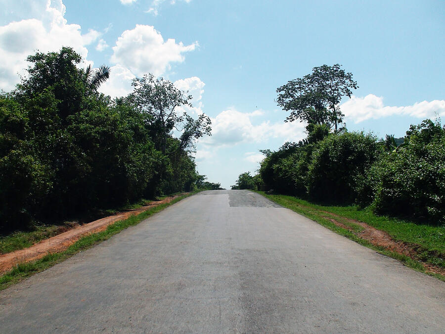 Scene Of An Empty Road While Traveling Around In Cuba Photograph by Livinus