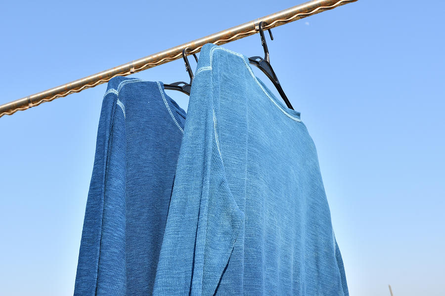 Scenery of drying indigo dyed T-shirts Photograph by Yata