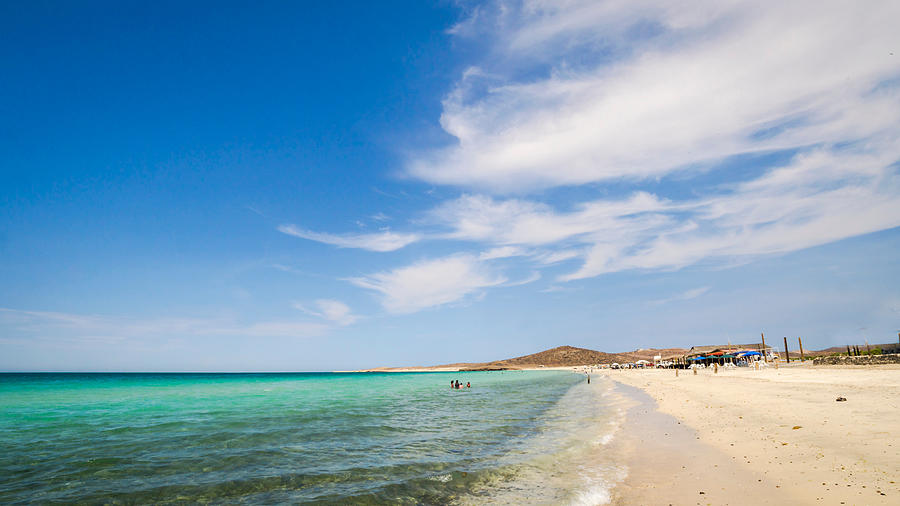 Scenic View Of Beach Against Blue Sky Photograph by Jesse Coleman / EyeEm Scenic View Of Beach Against Blue Sky Photograph by Jesse Coleman / EyeEm