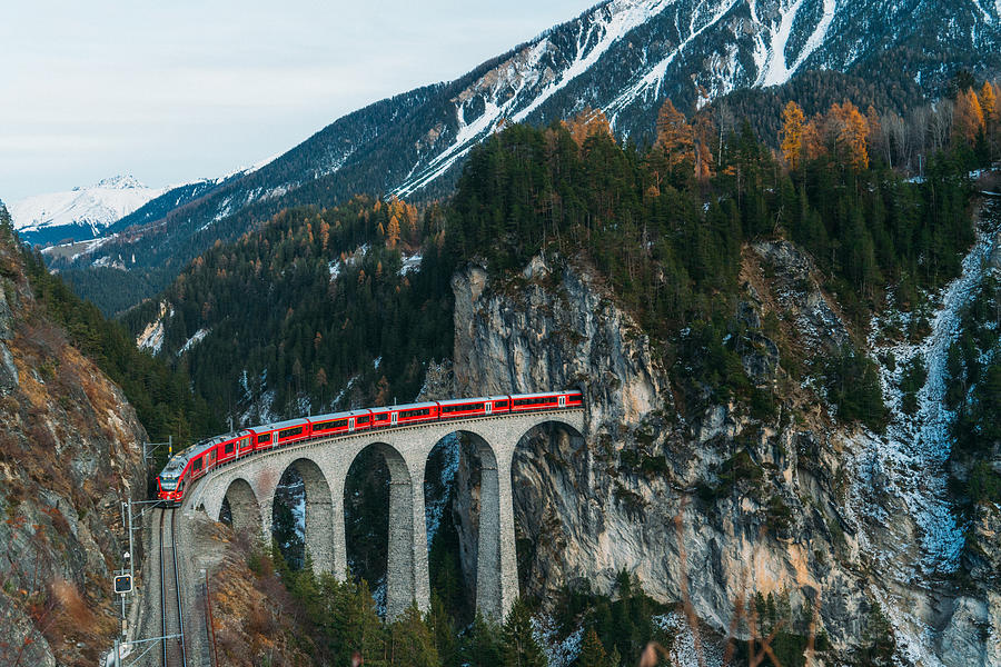 Scenic  view of train on  Landwasser viaduct in Switzerland Photograph by Oleh_Slobodeniuk