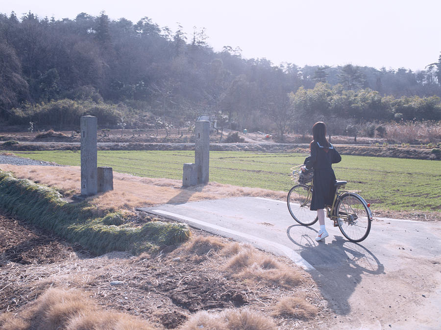 School School girl cycling Photograph by Dex Image