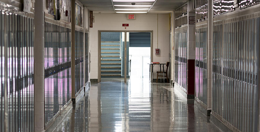Schools closed empty hallway Photograph by WoodysPhotos