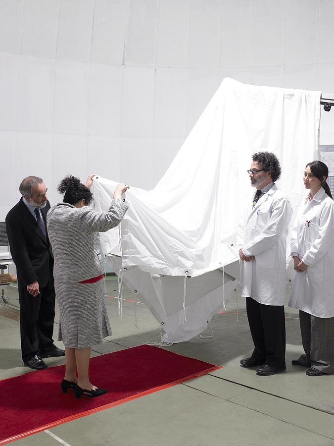 Scientists unveil invention to dignitaries Photograph by Michael Blann