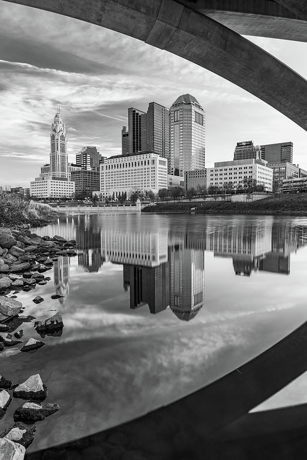 Scioto River City Reflections Under The Bridge - Black And White Photograph by Gregory Ballos