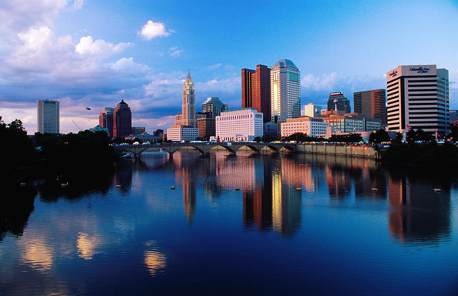 Scioto River in front of city skyline, Columbus, United States of America Photograph by Richard  IAnson
