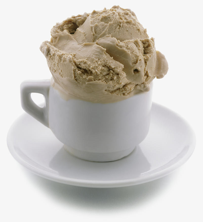 Scoop of coffee ice cream in espresso cup Photograph by Steve Wisbauer