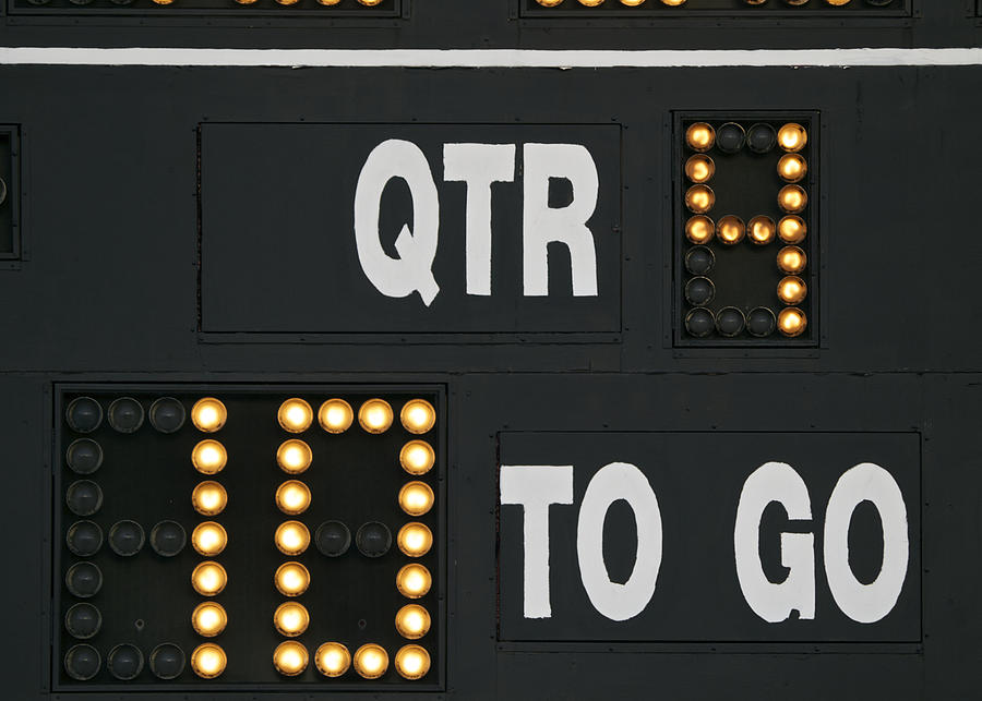 Scoreboard on American Football field yards to go and QTR Photograph by GarysFRP