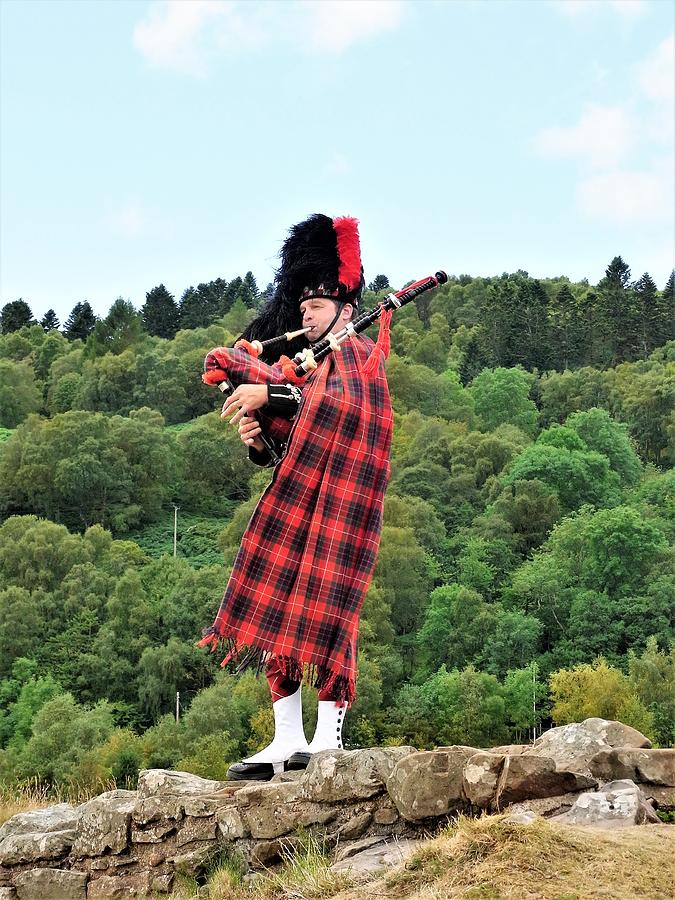 Scottish Piper Photograph by Thomas Gledhill