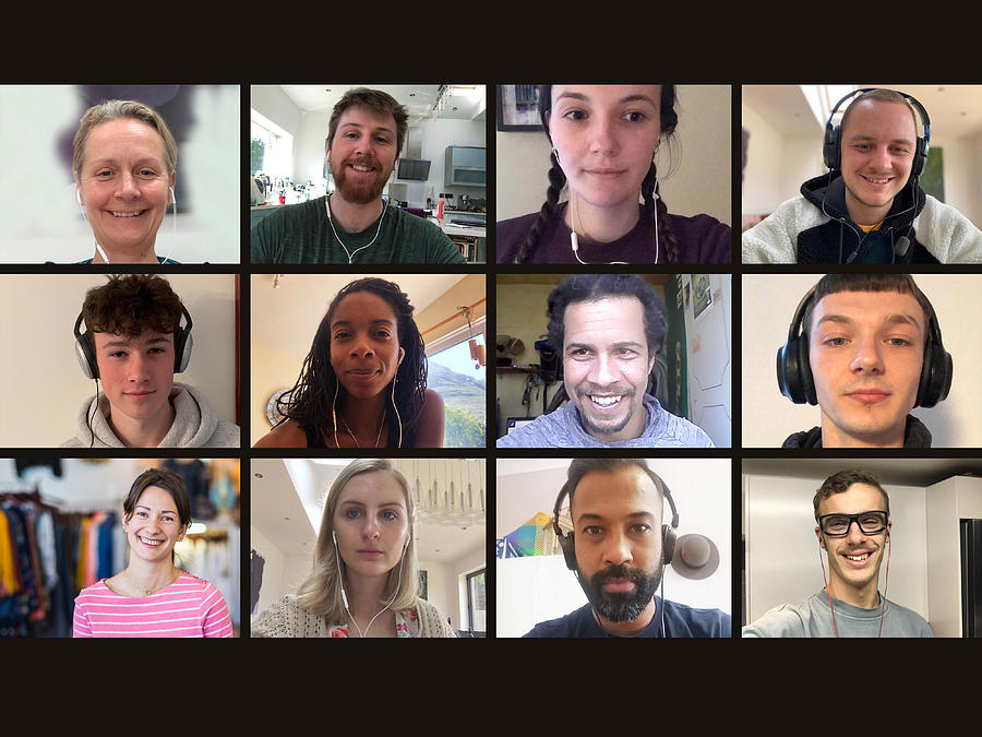 Screen of multiple friends socialising on video call Photograph by Alistair Berg