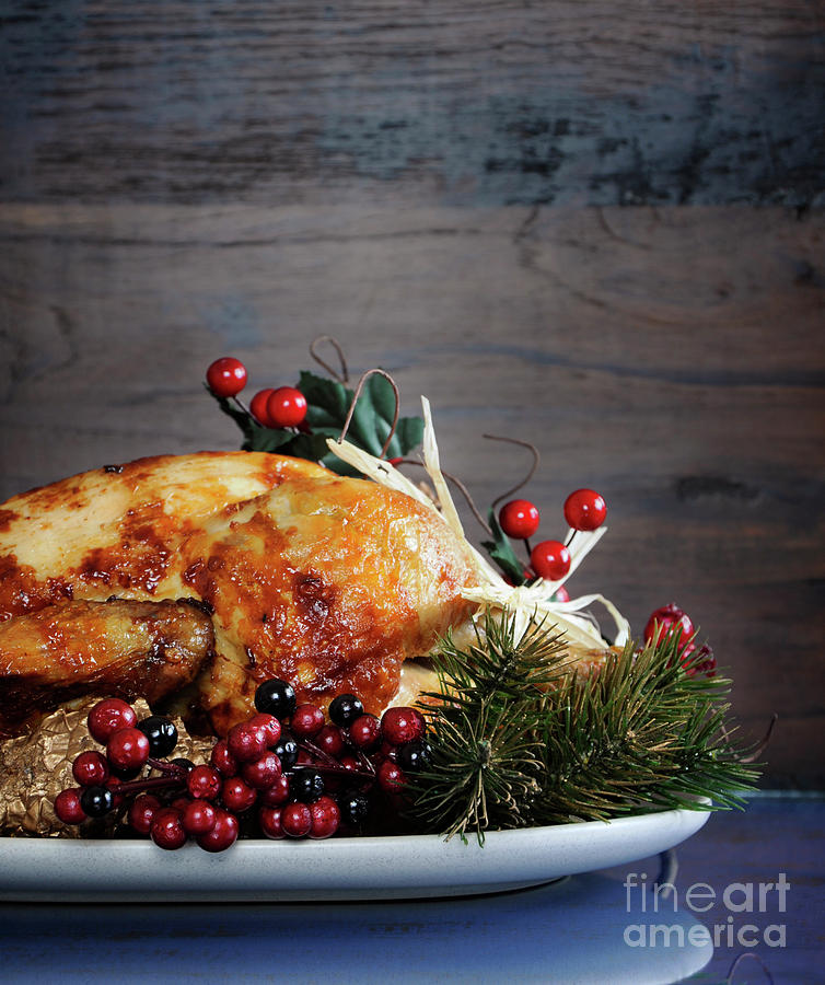 Scrumptious roast turkey chicken on platter Photograph by Milleflore Images