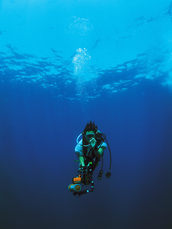 Scuba diver and camera Photograph by Dex Image