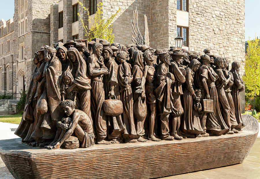 Sculpture commemorating Word Day of Migrants and Refugees  Photograph by Winston D Munnings