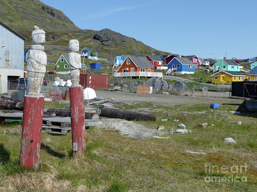 Sculptures and houses at Narsaq, Greenland Photograph by Phil Banks
