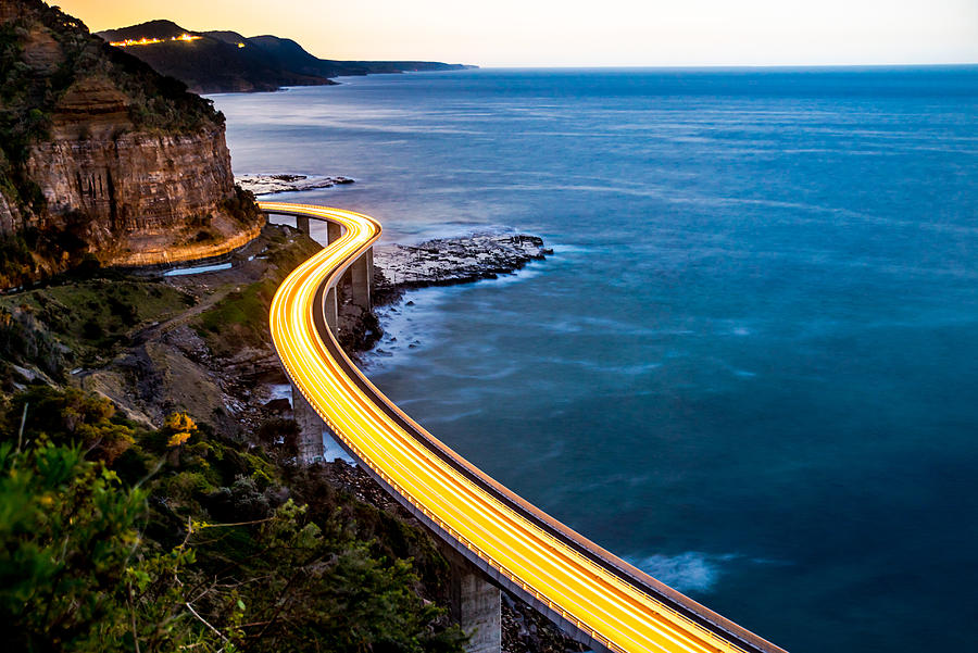 Sea Cliff Bridge Light Trails traffic Photograph by Logan Campbell