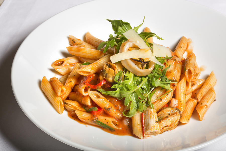 Sea food and tomato sauce pasta Photograph by Rilueda