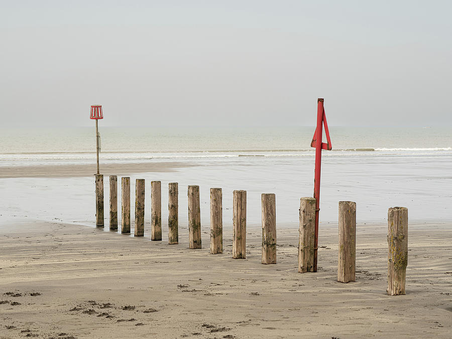 Sea groynes Photograph by Average Images