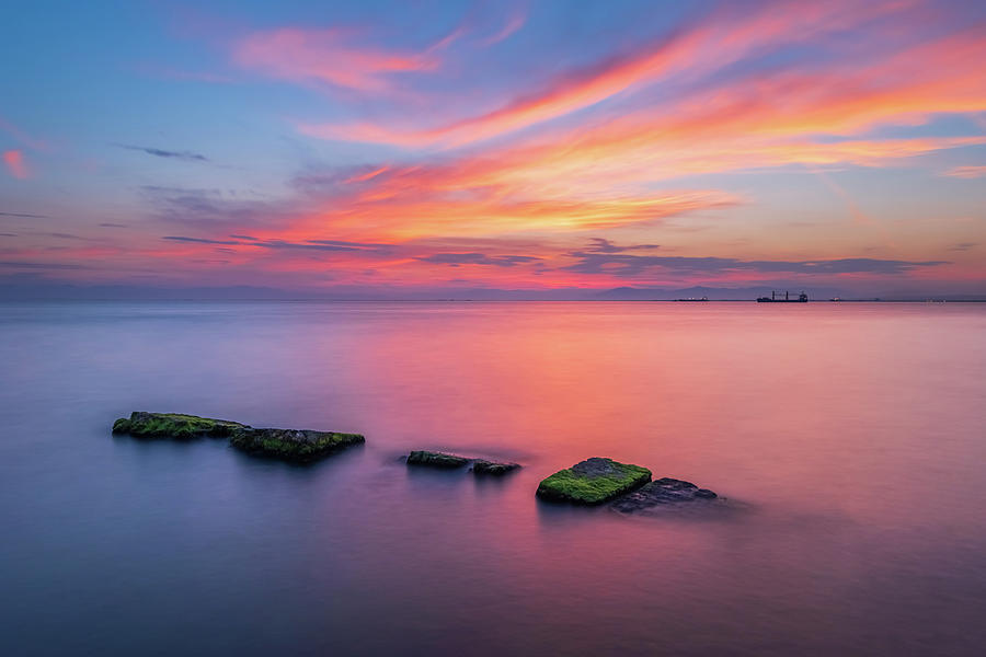 Sea Of Tranquility And A Colorful Sunset Photograph