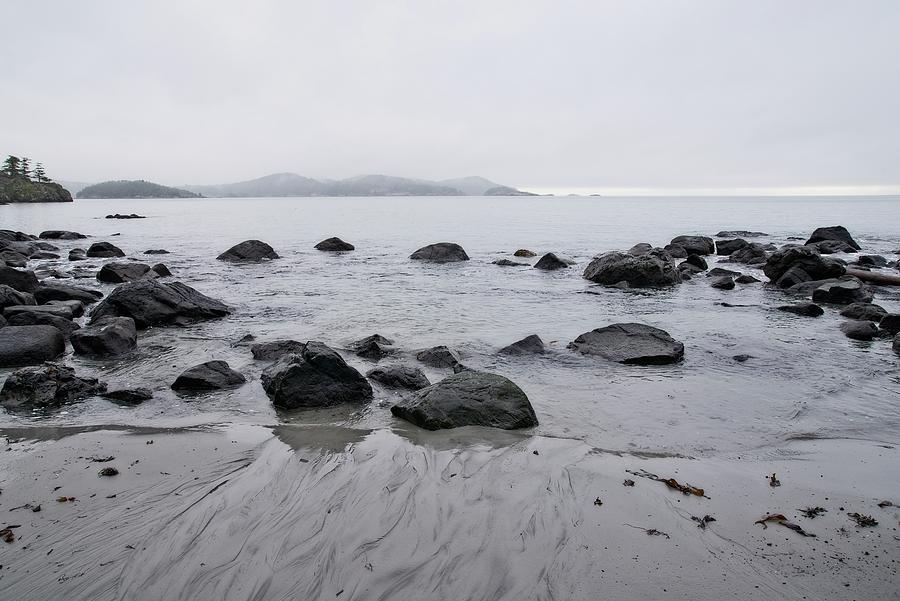 Sea Rocks And Misty Mountains Photograph