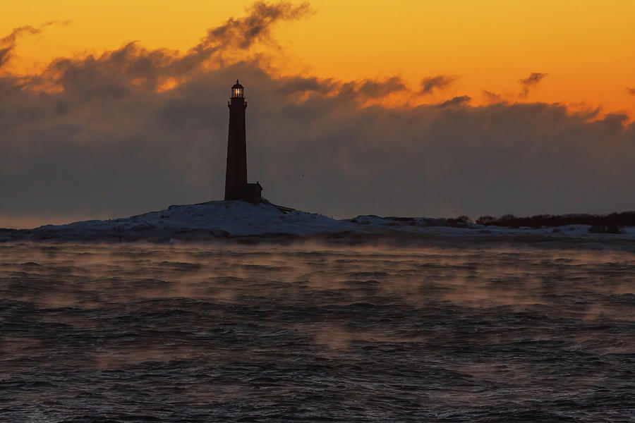 Sea Smoke at Thatcher Island lighthouse Photograph by Jeff Folger