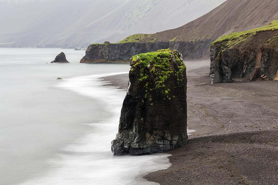 Sea stack rock formations near beach cliffs Photograph by Jeremy Woodhouse