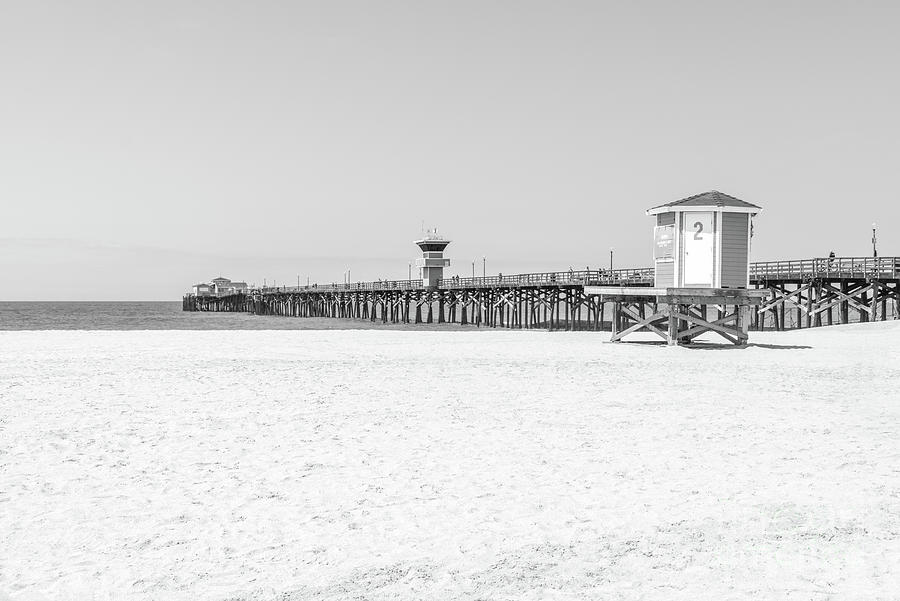 Seal Beach Pier and Lifeguard Tower Black and White Photo Photograph by Paul Velgos