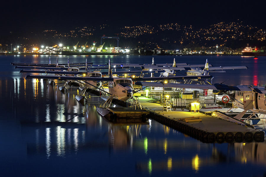 Seaplanes Docked at Coal Harbour Photograph by Michael Russell