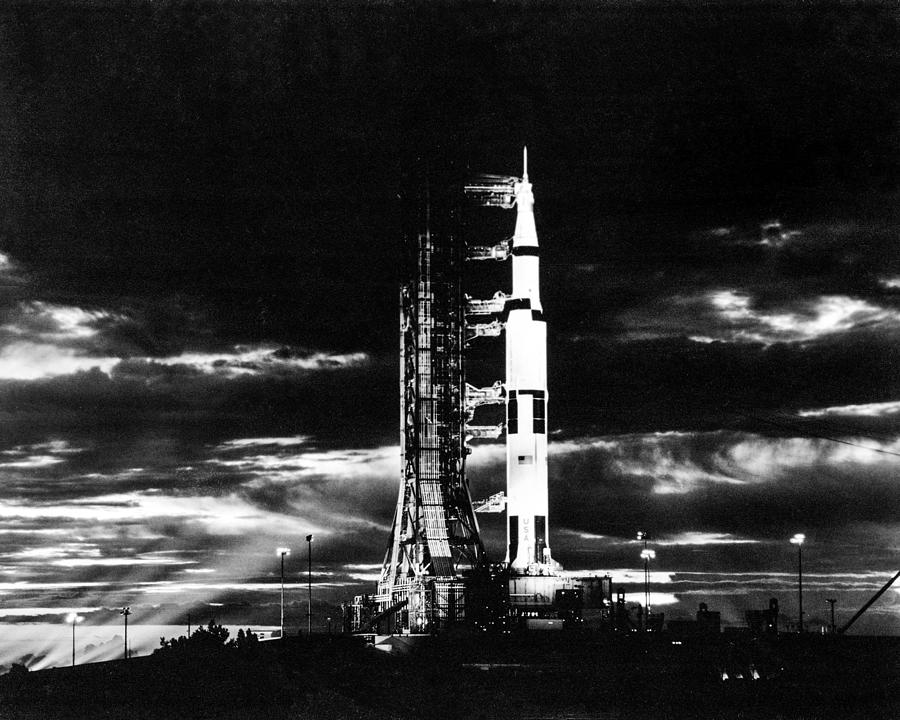 Black And White Painting - Searchlights illuminate this nighttime scene at Pad A Launch Complex 39 Kennedy Space Center Florida by Les Classics