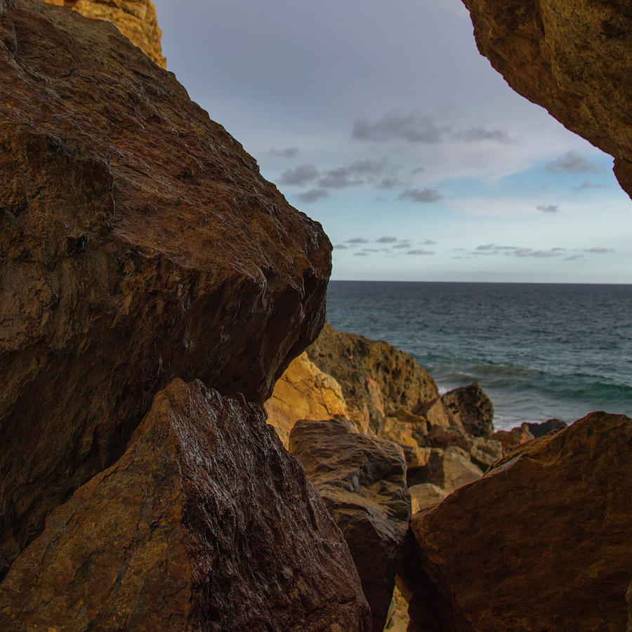 Seascape Framed by Rocks Photograph by Matthew DeGrushe